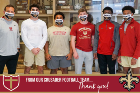 Crusaders Deck Out in Black and Gold for Saints Playoff Game