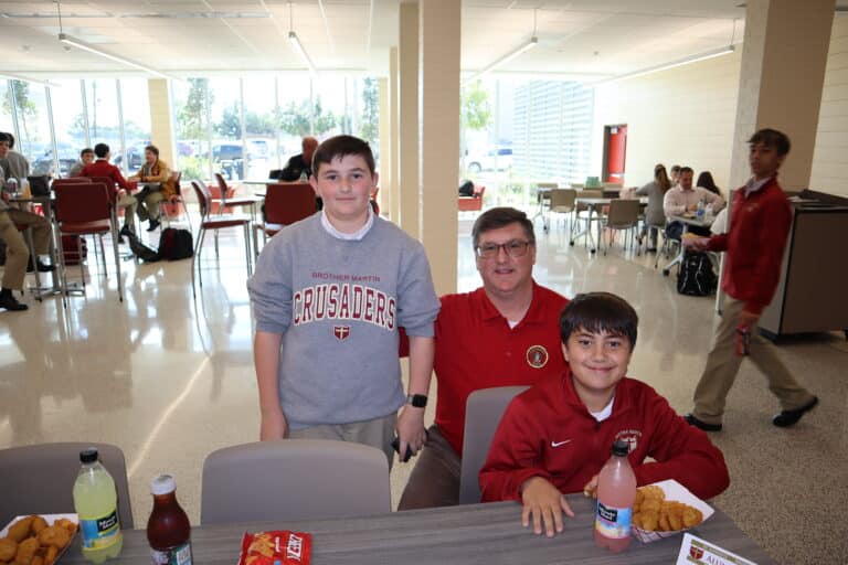 8th Grade Alumni Dads Visit Their Crusader Sons During Lunch