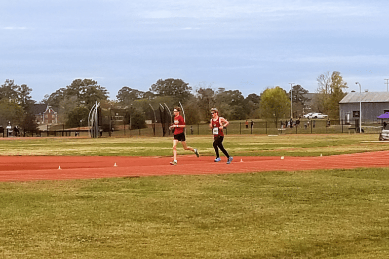 Brother Martin Crusader Harrier Volunteers as Runner Guide at State Championship